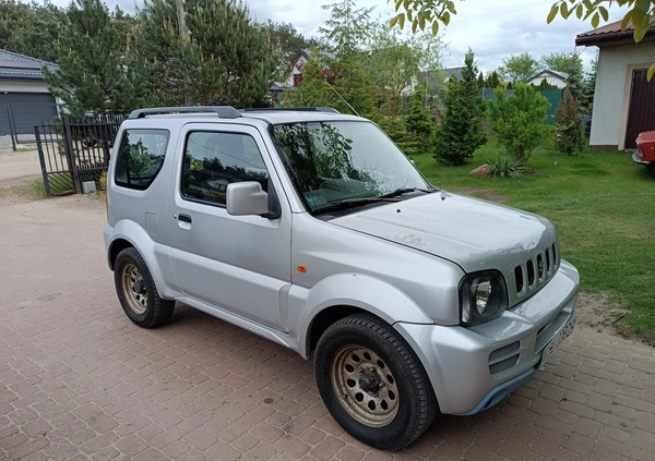 Suzuki Jimny cena 32900 przebieg: 154200, rok produkcji 2010 z Górowo Iławeckie małe 352